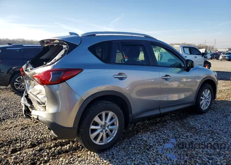 2014 Mazda Cx-5 Touring z USA, uszkodzony, nr VIN JM3KE2CY2E0304792